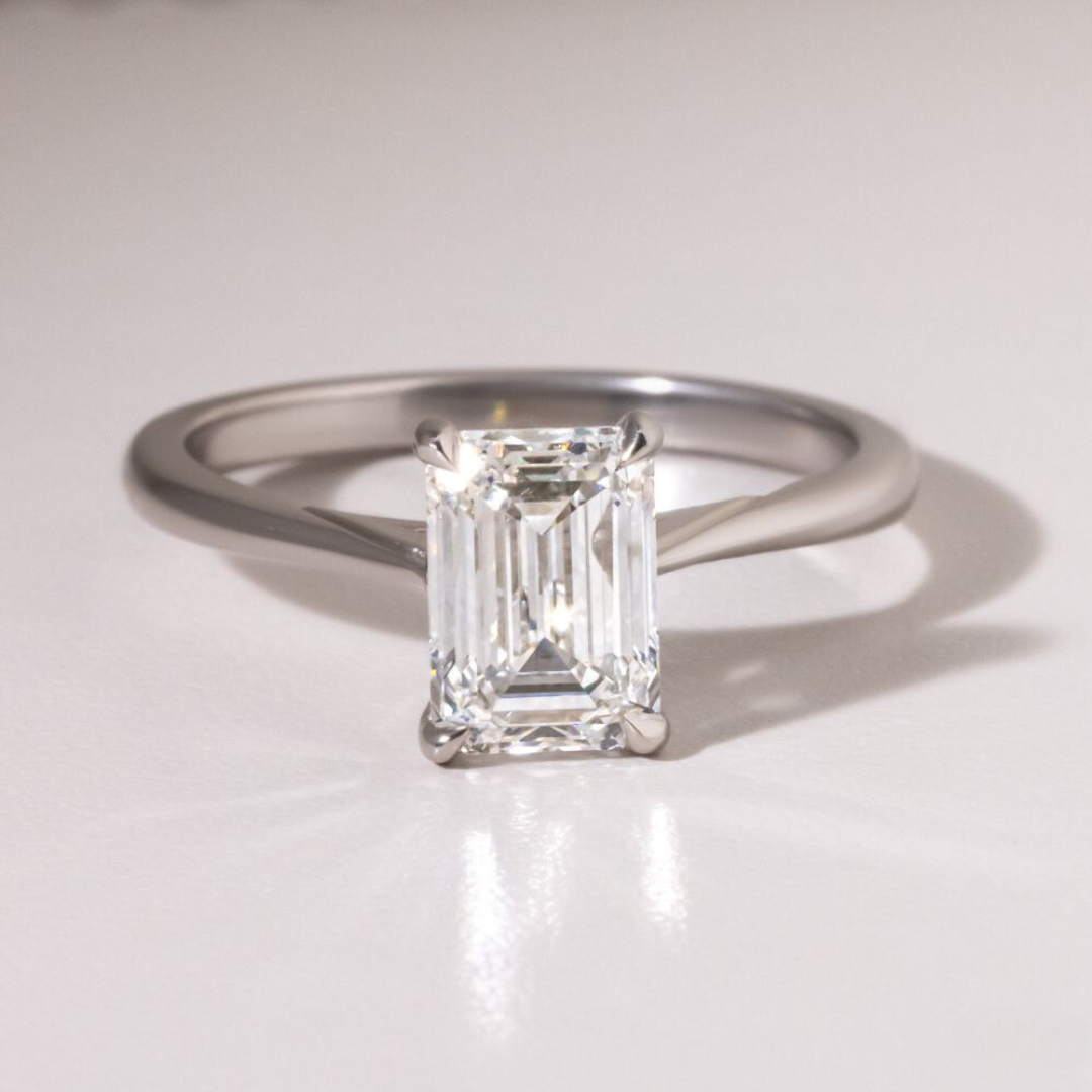 Bezel Emerald Cut Ring: A Timeless Elegance in Jewelry